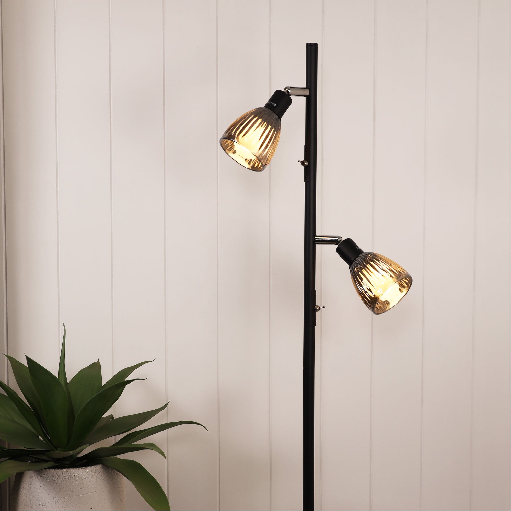 Alma Twin Smoked Glass Floor Lamp styled in a room