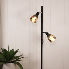 Alma Twin Smoked Glass Floor Lamp styled in a room