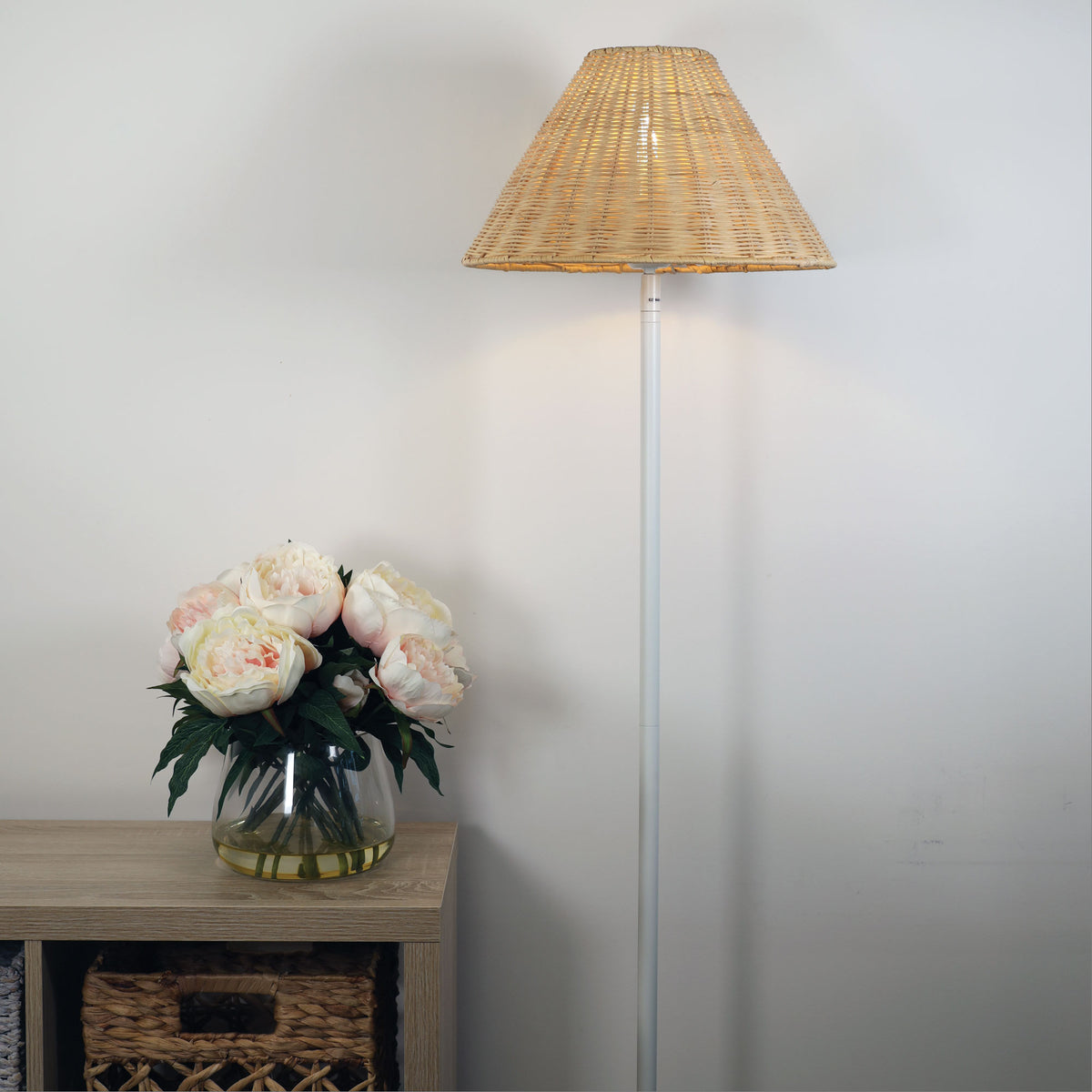 Belize Rattan Floor Lamp styled in a room